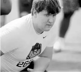  ?? CHRIS HAYS/STAFF ?? Bishop Moore standout Eric Seidelman, an offensive lineman, kicked off the day with his letter of intent marking UCF’s first signee at 7:02 a.m Wednesday morning.