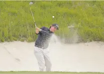  ?? SETH WENIG/ASSOCIATED PRESS ?? Phil Mickelson hits out of a bunker during a practice round Wednesday for the U.S. Open in Southampto­n, N.Y.