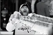  ?? ASSOCIATED PRESS ?? WASHINGTON CAPITALS LEFT WING Alex Ovechkin hoists the Stanley Cup after the Capitals defeated the Golden Knights in Game 5 of the NHL Stanley Cup Final Thursday in Las Vegas.