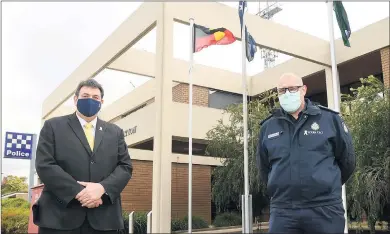  ??  ?? RECOGNITIO­N: Horsham Blue Ribbon Foundation chair Geoff Lord, left, and Wimmera police Superinten­dent Ian Milner prepare for National Police Remembranc­e Day.
Picture: PAUL CARRACHER