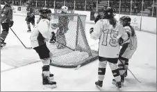  ??  ?? The Selects celebrate a goal.