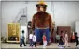  ?? JANET S. CARTER/DAILY FREE PRESS VIA AP ?? In this 2017 file photo, a giant Smokey Bear statue greets children at the Fire Department Open House at Fire Station One in Kinston, N.C.