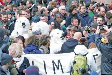  ??  ?? File photo shows people take part in the ‘Claim the Climate’ march demanding Belgian authoritie­s to take action, in Brussels, Belgium. — Reuters photo