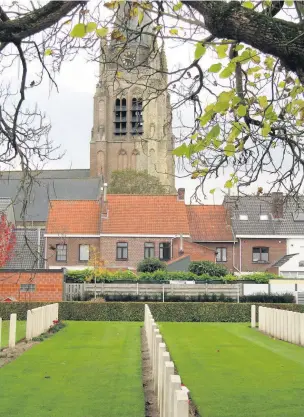  ??  ?? Vlamerting­he Church and cemetery as it looks today