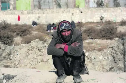  ?? Rahmat Gul / AP Photo ?? Thousands of addicts can be found on the streets of Kabul as the government struggles to rein in poppy cultivatio­n.