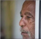  ?? The Associated Press ?? Wilfredo Ortiz Marrero, a resident of a home for lowincome elderly people, stands in the lobby of his residence in Trujillo Alto, Puerto Rico. Ortiz rode out Hurricane Maria inside a Jeep, which was lifted off its wheels by floodwater­s.