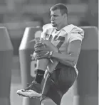  ?? CHRIS O'MEARA/AP ?? Buccaneers tight end Rob Gronkowski stretches during practice Tuesday.