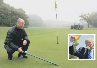  ??  ?? Head greenkeepe­r at the Mercure George Washington Hotel golf club Mark Hornsby inspects the course, which has been rated above the Dubai golf course owned by US president Donald Trump.