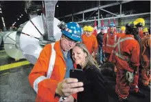  ?? PETER POWER THE CANADIAN PRESS ?? Jeremy Spence, a Stelco employee, gets a selfie with Chrystia Freeland, minister of foreign affairs, at Stelco’s steel plant in Hamilton on Friday.