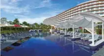  ??  ?? CLOCKWISE FROM TOP: Mihama American Village; Kokusai Dori; Hilton Okinawa Chatan Resort