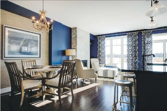  ?? MARK HOLLERON ?? The Hudson — a townhome model Tamarack just opened at Findlay Creek— melds bold cues with rustic elements.