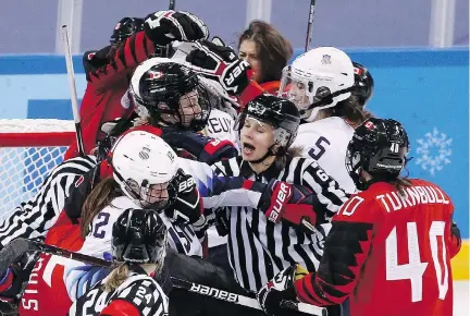  ?? MADDIE MEYER/GETTY IMAGES ?? Canada’s 2-1 victory over the United States at Kwandong Hockey Centre in Gangneung, South Korea, featured several skirmishes between the longtime rivals. The U.S. outshot Canada 45-24, but lost to the Canadians for a fifth straight time.