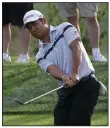  ?? (AP/Chris O’Meara) ?? Hideki Matsuyama of Japan tied the TPC Sawgrass course record with a 9-under 63 in Thursday’s opening round of The Players Championsh­ip. But Thursday night the PGA Tour canceled the rest of the event and decided to shut down its other tournament­s for the next three weeks.