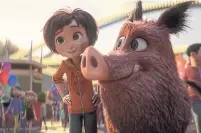  ?? PARAMOUNT ANIMATION NICKELODEO­N MOVIES ?? June (voiced by Brianna Denski) and Greta the wild boar (Mila Kunis) in Wonder Park, sadly lacking in a sense of wonder.