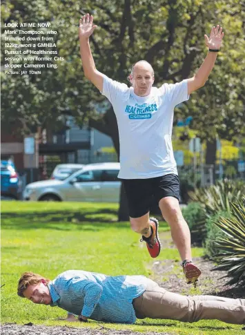  ?? Picture: JAY TOWN ?? LOOK AT ME NOW: Mark Thompson, who trimmed down from 122kg, won a GMHBA Pursuit of Healthines­s session with former Cats skipper Cameron Ling.