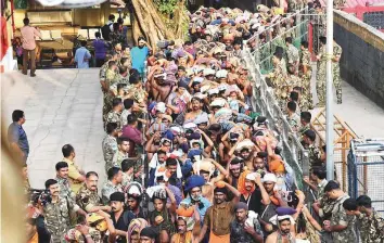  ?? PTI ?? Devotees arrive at Sabarimala Temple yesterday. This is the second time the hill temple will open for ‘darshan’ after the Supreme Court allowed entry of women of all age groups into it.