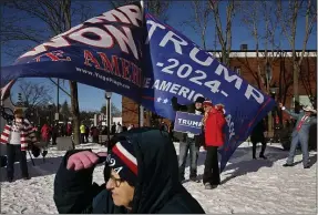  ?? CHIP SOMODEVILL­A — GETTY IMAGES ?? Supporters of Republican presidenti­al candidate and former President Donald Trump gather outside the Rochester Opera House hours ahead of a campaign rally Sunday in Rochester, New Hampshire.