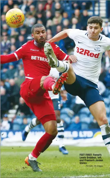  ?? PICTURE: PA Images ?? FEET FIRST: Forest’s Lewis Grabban, left, and Preston’s Jordan Storey