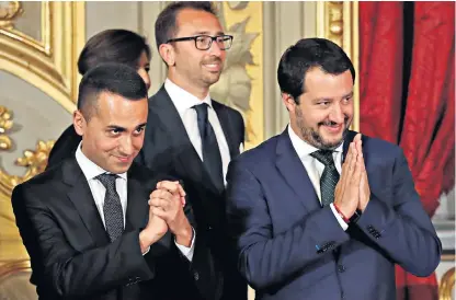  ??  ?? Luigi di Maio, Italy’s new labour minister, far left, and Matteo Salvini, the interior minister, in Rome
‘If the EU allows the Italians to do what they want on spending, the Germans won’t accept it. The euro will still die’