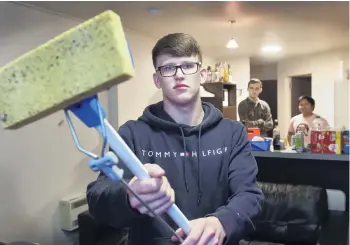  ?? PHOTO: PETER MCINTOSH ?? Strange and soggy situation . . . Students (from left) Sam Harrison, Julian Jones and Peter Remoto (all 20) had their flat broken into and then flooded this week.