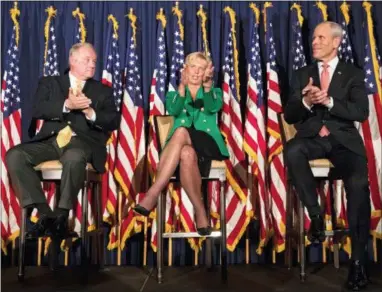  ?? THE ASSOCIATED PRESS ?? In this Oct. 19, 2017, file photo, candidates seeking the Republican nomination to challenge Democratic Gov. Tom Wolf’s 2018 bid for re-election, Pennsylvan­ia Sen. Scott Wagner, left, R-York County, Laura Ellsworth, center, and Paul Mango, right, take part in the Montgomery County Republican Committee’s gubernator­ial forum in Blue Bell, Pa.