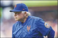  ?? Associated Press ?? Mets manager Buck Showalter waits for the team’s game against the Philadelph­ia Phillies, Aug. 19, in Philadelph­ia. Showalter was named National League Manager of the Year on Tuesday in voting by a Baseball Writers’ Associatio­n of America panel.