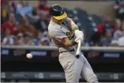  ?? STACY BENGS — THE ASSOCIATED PRESS ?? The Oakland Athletics’ Sean Murphy strikes out swinging against the Minnesota Twins during the fourth inning Friday in Minneapoli­s.