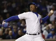  ?? DAVID J. PHILLIP/THE ASSOCIATED PRESS ?? Closer Aroldis Chapman, who has rejoined the Yankees on a five-year deal, threw 273 pitches during 13 playoff appearance­s with the Chicago Cubs.