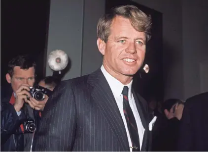  ??  ?? Along with his brothers, Robert Kennedy personifie­d a commitment to public service. GEORGE FRESTON / GETTY IMAGES