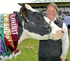  ??  ?? Left: Scholarshi­p winner Teegan Hall, 18, with the show’s Supreme Exhibit, a Friesian owned by her father Alister, above left. His brother Rob’s Southdown ram was judged Supreme Sheep.