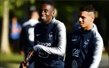  ?? (Photos AFP) ?? Blaise Matuidi (avec Ben Yedder) : le sourire et le moteur des Bleus.