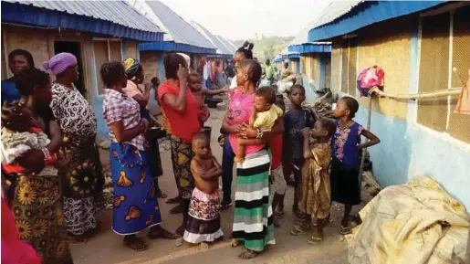  ??  ?? Women and children at the Benue IDPs camp...missing home