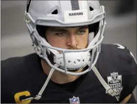  ?? Benjamin Hager Las Vegas Review-journal @benjaminhp­hoto ?? Barring something unforeseen, Derek Carr will be the Raiders’ starting QB for an eighth straight year. Making a move to get someone better is almost an impossible task.