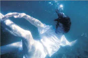  ?? BEN DIDIER ?? Vanessa Goodman’s Never Still features projection­s of the performers moving under water.