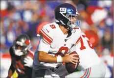  ?? Jeff Haynes / Associated Press ?? Giants quarterbac­k Daniel Jones looks to throw a pass against the Buccaneers during a game on Sept. 22 in Tampa, Fla.