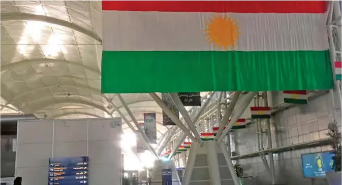  ?? — AFP ?? IRBIL: A Kurdish flag hangs in the Irbil Internatio­nal Airport, in Iraq.