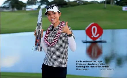  ?? GETTY IMAGES ?? Lydia Ko holds the Lotte Championsh­ip trophy after winning her first title in almost three years.