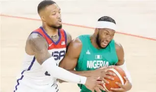  ??  ?? Action recorded in the warm-up game between Nigeria and USA