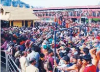  ?? File/ Associated Press ?? Worshipper­s queue during a pilgrimage at the Sabarimala temple in Kerala.