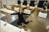  ?? SARAH A. MILLER/TYLER MORNING TELEGRAPH VIA AP ?? Sarah Burton, owner of Studio B Pilates + Barre leads a Zoom-based live dance conditioni­ng class at her studio in Tyler, Texas, April 4, 2020.