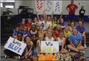  ??  ?? Kristina Wilder / Rome News-Tribune
The Johnson Wildcat cheerleade­rs get ready to cheer Krige Schabort on to victory during the school pep rally.