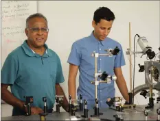  ??  ?? CAPE Peninsula University of Technology physicist Dr Kessie Govender and doctoral candidate Adrian Wyngaard, who are part of a group of students involved in cooling a cloud of rubidium atoms to around 17 micro Kelvins, which is approximat­ely -273ºC below 0.