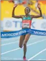  ?? LUCY NICHOLSON / REUTERS ?? Edna Kiplagat crosses the finish line to win the women’s marathon during the IAAF World Athletics Championsh­ips in Moscow on Saturday.