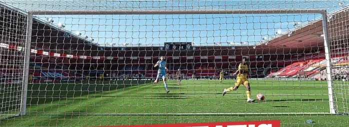  ?? PA ?? Gift-wrapped: Eddie Nketiah runs clear to roll in the opener and punish the error by keeper Alex McCarthy