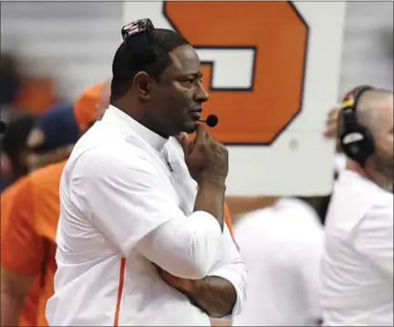  ?? ADRIAN KRAUS - THE ASSOCIATED PRESS ?? Syracuse head coach Dino Babers watches from the sideline during the second half of an NCAA college football game against Louisville in Syracuse, N.Y., Friday, Nov. 9, 2018. (AP Photo/Adrian Kraus)