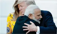  ?? AP ?? MODI’S TRADEMARK: Indian Prime Minister Narendra Modi vibes well with US President Donald Trump. —