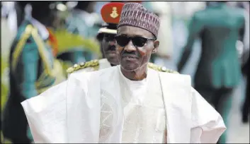  ?? THE ASSOCIATED PRESS FILE ?? Nigeria’s president, Muhammadu Buhari, commended government troops for “finally entering and crushing the remnants of the Boko Haram insurgents at Camp Zero,” located deep within the heart of Sambisa Forest.