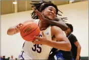  ?? JOSEPH DYCUS — STAFF PHOTOGRAPH­ER ?? Oakland Tech's Omar Staples Jr. drives through contact during Saturday's title-game win over rival Oakland.