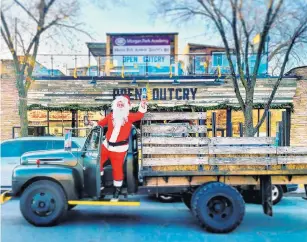  ?? OPEN OUTCRY BREWING COMPANY ?? Open Outcry’s restored 1948 Ford truck premiered in time for deliveries from Santa Claus in December. The wood of the cargo hold on the truck was left intact because it matches the reclaimed barn wood used on in the brewery decor.