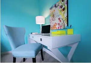  ?? BRUNO SCHLUMBERG­ER/OTTAWA CITIZEN ?? Kelly Maiorino has designed a fun and funky study area in the bedroom for her university daughter. ‘It is fresh, clean and functional,’ she says.